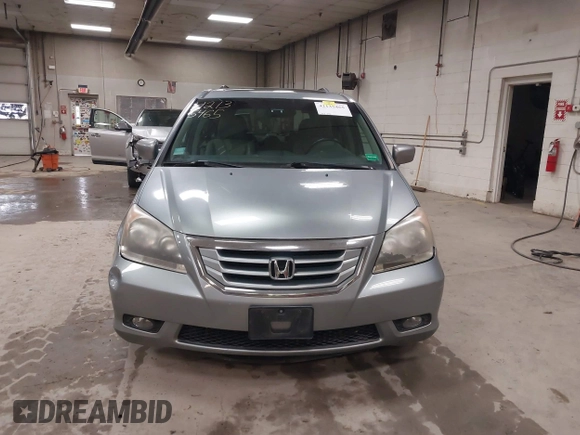 2009 Honda Odyssey EX-L with VIN 5FNRL38789B015524, listed as a IAAI auction lot 42135465 with 242,005 mi miles. Bid and sale history available at carsss.com. Image 13.