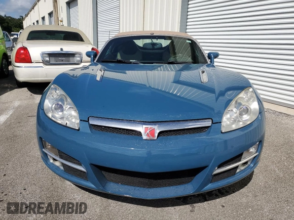 2007 Saturn Sky z VIN 1G8MB35B67Y129616, wystawiony jako Copart lot #74225194 z przebiegiem Nie podano mil oraz Szkoda całkowita • Salvage title. Historia ofert i sprzedaży dostępna na DreamBid. Obrazek 5.