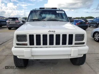 1998 Jeep Cherokee Sport with VIN 1J4FT68S7WL174028, listed as a Copart auction lot 73812524 with 0 mi miles and Salvage Title. Bid and sale history available at carsss.com. Image 5.