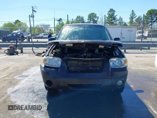 2006 Ford Escape XLT with VIN 1FMCU03116KB57387, listed as a IAAI auction lot 41813041 with 180,417 mi miles. Bid and sale history available at carsss.com. Image 13.