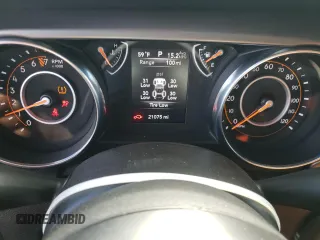 2020 Jeep Wrangler Willys z VIN 1C4GJXAG7LW260669, wystawiony jako Copart lot #57472685 z przebiegiem 21 075 mil mil oraz Szkoda całkowita • Salvage title. Historia ofert i sprzedaży dostępna na DreamBid. Obrazek 9.