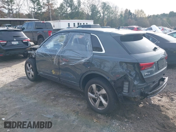 2019 Audi Q3 Premium with VIN WA1AECF37K1076492, listed as a IAAI auction lot 41099499 with 80,975 mi miles and . Bid and sale history available at DreamBid. Image 3.