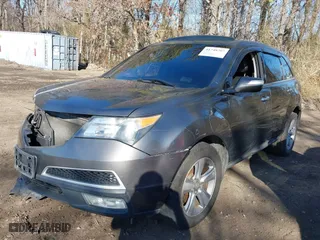 2012 Acura MDX with VIN 2HNYD2H28CH547956, listed as a IAAI auction lot 41748207 with 132,185 mi miles. Bid and sale history available at carsss.com. Image 2.