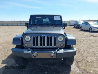 2017 Jeep Wrangler Unlimited Sahara with VIN 1C4BJWEG7HL641347, listed as a IAAI auction lot 41833356 with 84,735 mi miles. Bid and sale history available at carsss.com. Image 13.