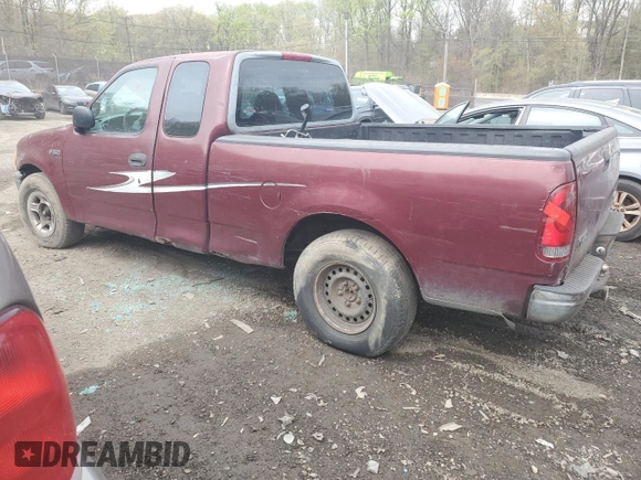 1998 Ford F-150 with VIN 1FTZX1727WNB55284, listed as a Copart auction lot 51781465 with 258,600 mi miles and Salvage title. Bid and sale history available at DreamBid. Image 2.