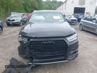 2018 Audi Q7 Premium Plus z VIN WA1LHAF7XJD049338, wystawiony jako IAAI lot #42286676 z przebiegiem 103 462 mil mil oraz . Historia ofert i sprzedaży dostępna na DreamBid. Obrazek 6.