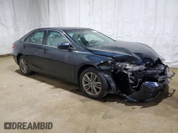 2015 Toyota Camry XLE with VIN 4T1BF1FK3FU077674, listed as a Copart auction lot 52679985 with 128,417 mi miles and Salvage Title. Bid and sale history available at DreamBid. Image 4.