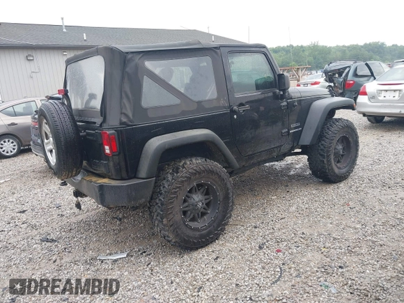 2015 Jeep Wrangler Willys Wheeler with VIN 1C4AJWAG8FL759566, listed as a IAAI auction lot 42716154 with 95,744 mi miles and . Bid and sale history available at DreamBid. Image 4.