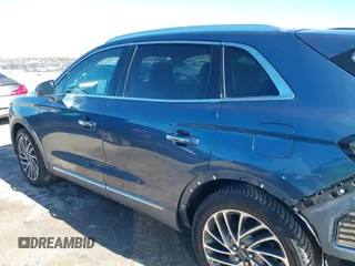 2019 Lincoln Nautilus Reserve with VIN 2LMPJ6LP3KBL51283, listed as a IAAI auction lot 41204810 with 91,184 mi miles and . Bid and sale history available at DreamBid. Image 15.