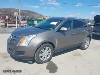 2012 Cadillac SRX Luxury Collection with VIN 3GYFNDE36CS542006, listed as a IAAI auction lot 41976675 with 137,418 mi miles. Bid and sale history available at carsss.com. Image 2.
