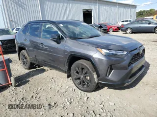 2023 Toyota RAV4 Hybrid XSE with VIN 4T3E6RFV1PU112579, listed as a Copart auction lot 74387924 with 103,340 mi miles and Salvage title. Bid and sale history available at DreamBid. Image 4.
