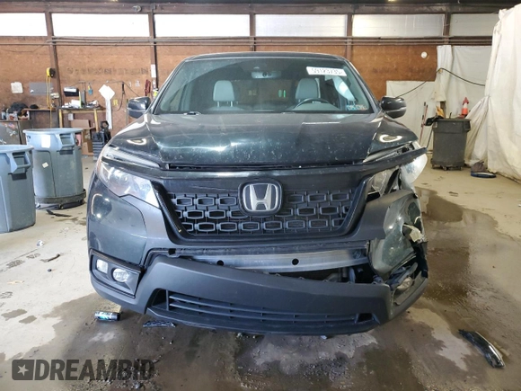 2020 Honda Passport EX-L with VIN 5FNYF8H57LB011549, listed as a Copart auction lot 59123735 with 127,797 mi miles and Salvage title. Bid and sale history available at DreamBid. Image 5.