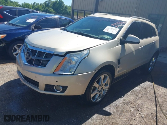 2011 Cadillac SRX Premium Collection with VIN 3GYFNCEY6BS507874, listed as a IAAI auction lot 42320240 with 164,138 mi miles and . Bid and sale history available at DreamBid. Image 2.