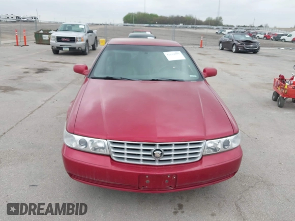 2001 Cadillac Seville z VIN 1G8KS54Y91U227846, wystawiony jako IAAI lot #42134095 z przebiegiem 216 766 mil mil oraz . Historia ofert i sprzedaży dostępna na DreamBid. Obrazek 12.