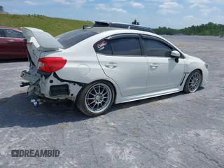 2017 Subaru WRX Premium with VIN JF1VA1E64H9828782, listed as a IAAI auction lot 40722034 with 86,554 mi miles and . Bid and sale history available at DreamBid. Image 4.