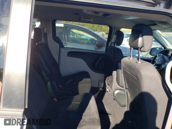 2017 Dodge Grand Caravan SE z VIN 2C4RDGBG8HR780586, wystawiony jako Copart lot #77265624 z przebiegiem 108 775 mil mil oraz Czysty tytuł • Clean title. Historia ofert i sprzedaży dostępna na DreamBid. Obrazek 11.