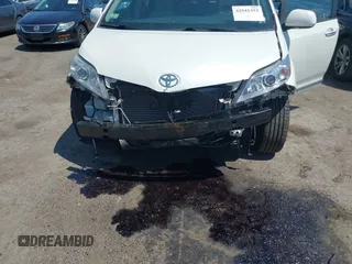 2012 Toyota Sienna XLE with VIN 5TDDK3DC5CS037659, listed as a IAAI auction lot 42541352 with 128,378 mi miles and . Bid and sale history available at DreamBid. Image 6.