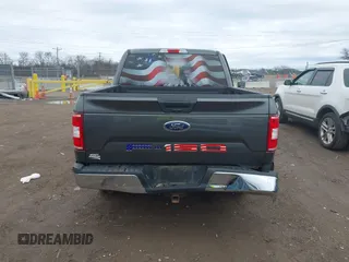 2019 Ford F-150 XL with VIN 1FTEW1CBXKFC64236, listed as a IAAI auction lot 41531279 with 102,965 mi miles and . Bid and sale history available at carsss.com. Image 16.