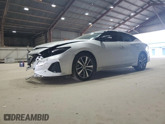 2021 Nissan Maxima SV with VIN 1N4AA6CV1MC514123, listed as a Copart auction lot 49128005 with 86,676 mi miles and Salvage Title. Bid and sale history available at DreamBid. Image 1.