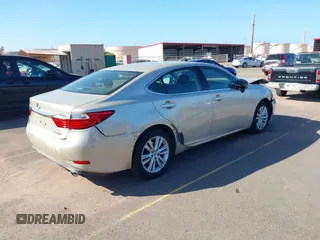 2013 Lexus ES 4dr Sdn with VIN JTHBK1GG1D2023369, listed as a IAAI auction lot 41539886 with 136,492 mi miles. Bid and sale history available at carsss.com. Image 4.