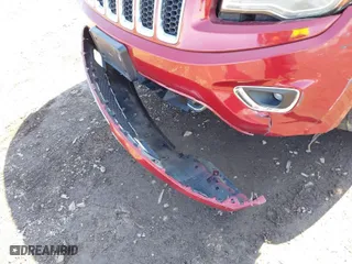 2014 Jeep Grand Cherokee Overland with VIN 1C4RJFCG2EC216406, listed as a IAAI auction lot 41944794 with 124,007 mi miles. Bid and sale history available at carsss.com. Image 6.