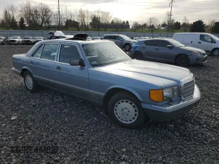 1986 Mercedes-Benz 300 with VIN WDBCB25D9GA279756, listed as a Copart auction lot 46860345 with 210,386 mi miles and Salvage Title. Bid and sale history available at carsss.com. Image 4.