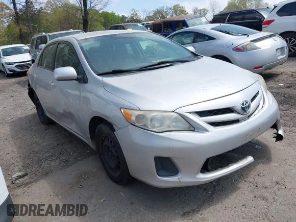 2011 Toyota Corolla L with VIN 2T1BU4EE8BC687021, listed as a IAAI auction lot 41934778 with 176,587 mi miles. Bid and sale history available at carsss.com. Image 1.