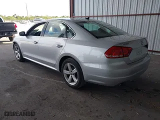 2014 Volkswagen Passat Wolfsburg Ed with VIN 1VWAS7A32EC036193, listed as a IAAI auction lot 41606595 with 77,536 mi miles. Bid and sale history available at carsss.com. Image 3.