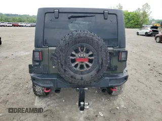2015 Jeep Wrangler Unlimited Rubicon Hard Rock z VIN 1C4HJWFG8FL681796, wystawiony jako Copart lot #56391915 z przebiegiem 74 529 mil mil oraz Szkoda całkowita • Salvage title. Historia ofert i sprzedaży dostępna na DreamBid. Obrazek 6.