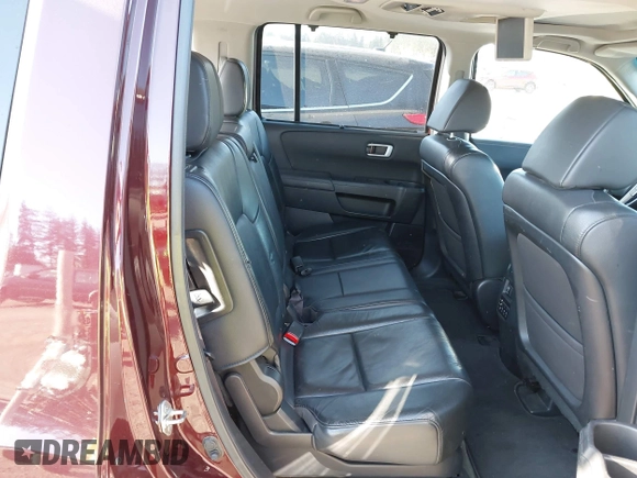 2014 Honda Pilot Touring with VIN 5FNYF4H93EB502117, listed as a IAAI auction lot 42086774 with 111,003 mi miles and . Bid and sale history available at carsss.com. Image 8.