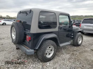 2004 Jeep Wrangler Sahara with VIN 1J4FA59SX4P713343, listed as a Copart auction lot 53608265 with 113,828 mi miles and Salvage title. Bid and sale history available at DreamBid. Image 3.