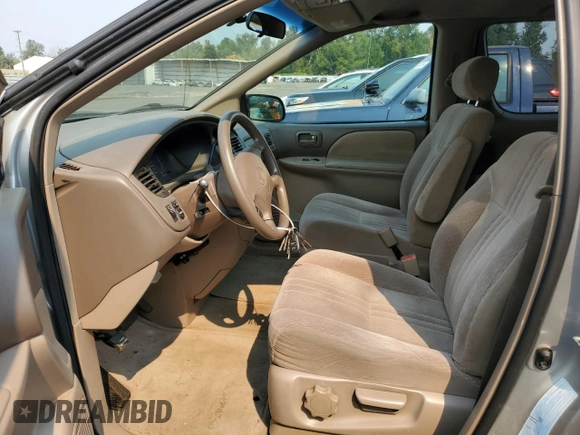 2001 Toyota Sienna CE with VIN 4T3ZF19C11U412899, listed as a Copart auction lot 70303244 with 190,025 mi miles and Salvage Title. Bid and sale history available at DreamBid. Image 7.
