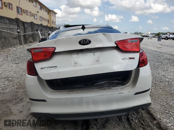 2015 Kia Optima EX z VIN 5XXGN4A70FG481037, wystawiony jako Copart lot #63845355 z przebiegiem Nie podano mil oraz Szkoda całkowita • Salvage title. Historia ofert i sprzedaży dostępna na DreamBid. Obrazek 6.
