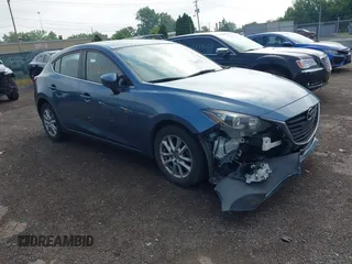 2014 Mazda 3 i Grand Touring z VIN JM1BM1M76E1124205, wystawiony jako IAAI lot #42827423 z przebiegiem 166 314 mil mil oraz . Historia ofert i sprzedaży dostępna na DreamBid. Obrazek 1.