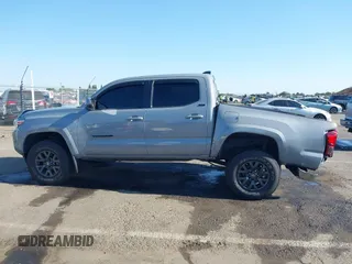 2021 Toyota Tacoma SR5 with VIN 5TFAZ5CN7MX101810, listed as a IAAI auction lot 42454418 with 58,930 mi miles and . Bid and sale history available at DreamBid. Image 15.