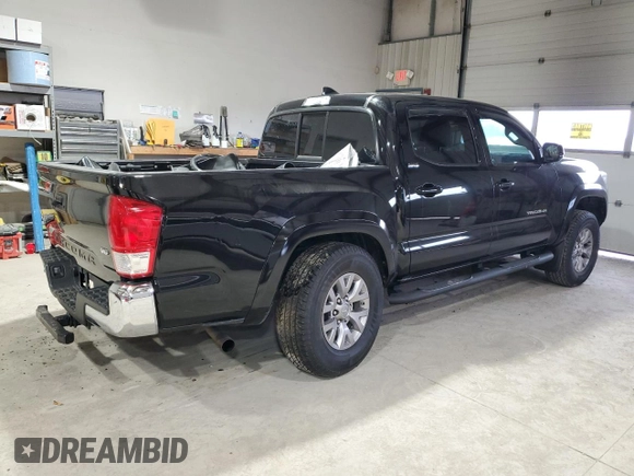 2017 Toyota Tacoma SR5 with VIN 5TFCZ5AN8HX067720, listed as a Copart auction lot 84801184 with 76,148 mi miles and Salvage title. Bid and sale history available at DreamBid. Image 3.