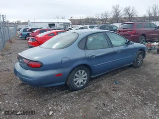 1999 Ford Taurus SE with VIN 1FAFP53S8XA278221, listed as a IAAI auction lot 41820964 with 115,109 mi miles. Bid and sale history available at carsss.com. Image 4.