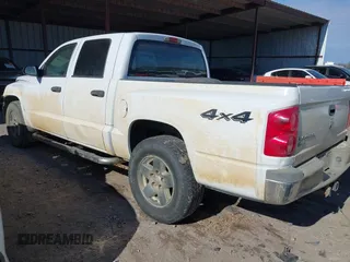 2005 Dodge Dakota SLT with VIN 1D7HW48K05S201235, listed as a IAAI auction lot 41395005 with 204,306 mi miles and . Bid and sale history available at carsss.com. Image 3.