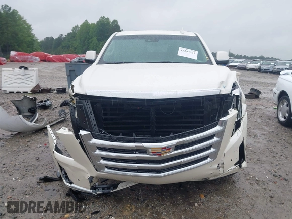 2015 Cadillac Escalade ESV Premium z VIN 1GYS4TKJ6FR708255, wystawiony jako IAAI lot #42244621 z przebiegiem 31 407 mil mil oraz . Historia ofert i sprzedaży dostępna na DreamBid. Obrazek 13.