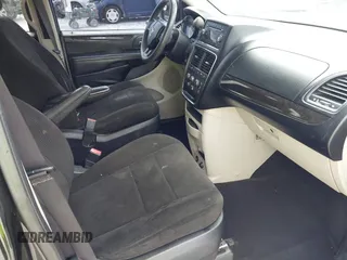 2012 Dodge Grand Caravan SE with VIN 2C4RDGBG9CR251169, listed as a IAAI auction lot 42066391 with 193,912 mi miles and . Bid and sale history available at DreamBid. Image 5.