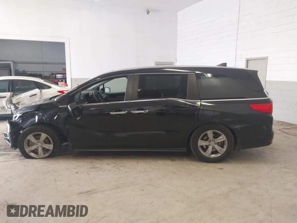 2018 Honda Odyssey EX-L with VIN 5FNRL6H78JB011284, listed as a IAAI auction lot 42000640 with 154,252 mi miles and . Bid and sale history available at DreamBid. Image 14.
