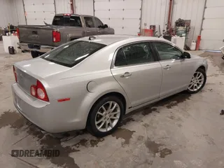 2012 Chevrolet Malibu LTZ with VIN 1G1ZG5E79CF205316, listed as a IAAI auction lot 41936446 with 133,578 mi miles and . Bid and sale history available at DreamBid. Image 4.