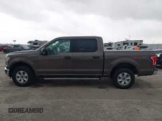 2015 Ford F-150 XLT with VIN 1FTEW1EP1FKE71345, listed as a IAAI auction lot 41946214 with 314,016 mi miles and . Bid and sale history available at DreamBid. Image 14.