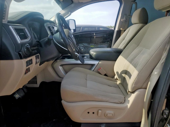 2016 Nissan Titan Platinum Reserve with VIN 1N6BA1F42GN506140, listed as a Copart auction lot 57171395 with 141,295 mi miles and Salvage title. Bid and sale history available at DreamBid. Image 7.