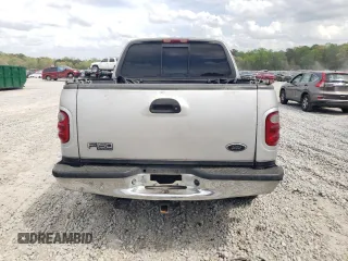 2002 Ford F-150 XLT with VIN 1FTRW07L12KA11845, listed as a Copart auction lot 51987205 with 282,865 mi miles and Salvage Title. Bid and sale history available at carsss.com. Image 6.