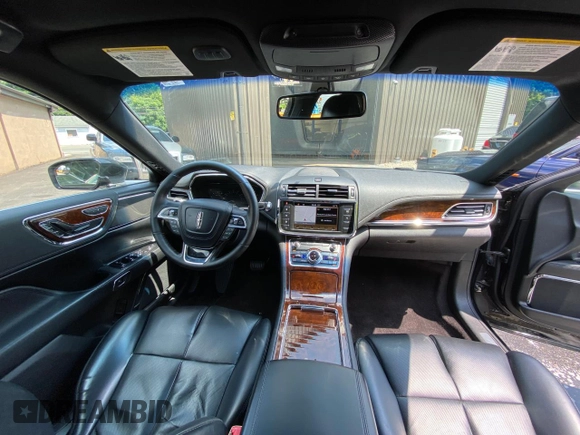2017 Lincoln Continental Livery z VIN 1LN6L9UKXH5608880, wystawiony jako Copart lot #74679524 z przebiegiem 173 780 mil mil oraz Tytuł czysty. Historia ofert i sprzedaży dostępna na DreamBid. Obrazek 9.