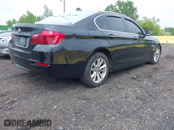 2014 BMW 5 Series 528i xDrive with VIN WBA5A7C54ED613352, listed as a IAAI auction lot 42197717 with 205,889 mi miles and . Bid and sale history available at DreamBid. Image 4.