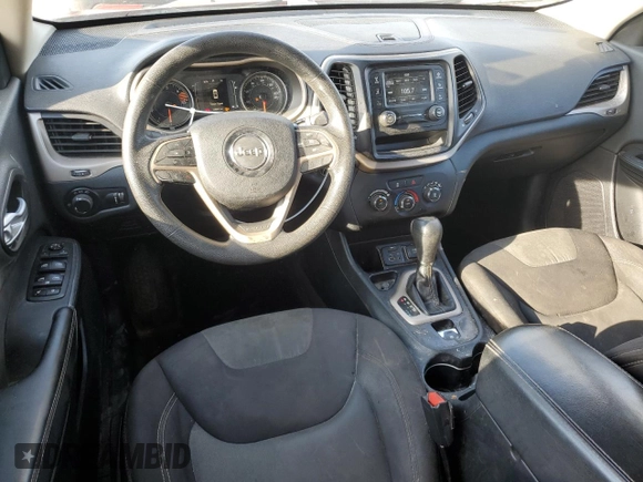 2016 Jeep Cherokee Sport with VIN 1C4PJLABXGW258322, listed as a Copart auction lot 51008975 with 128,865 mi miles and Salvage title. Bid and sale history available at DreamBid. Image 8.
