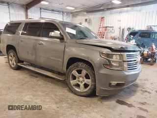 2019 Chevrolet Suburban Premier with VIN 1GNSKJKC1KR291629, listed as a IAAI auction lot 41565675 with 129,672 mi miles and . Bid and sale history available at DreamBid. Image 1.