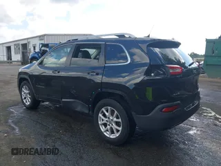 2015 Jeep Cherokee Latitude z VIN 1C4PJMCB4FW648897, wystawiony jako IAAI lot #42182493 z przebiegiem 129 457 mil mil oraz . Historia ofert i sprzedaży dostępna na DreamBid. Obrazek 3.
